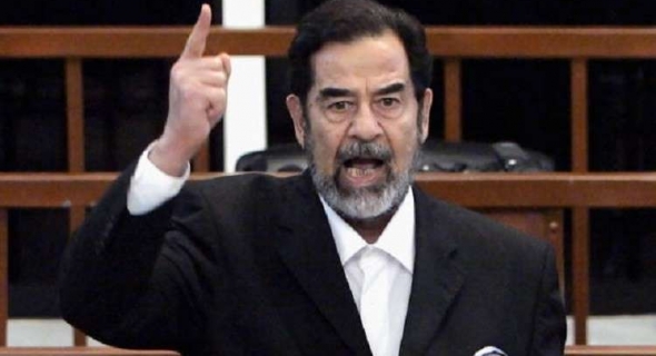 عبارة عن صدام حسين تتسبب في استنفار أجهزة الأمن الكويتية