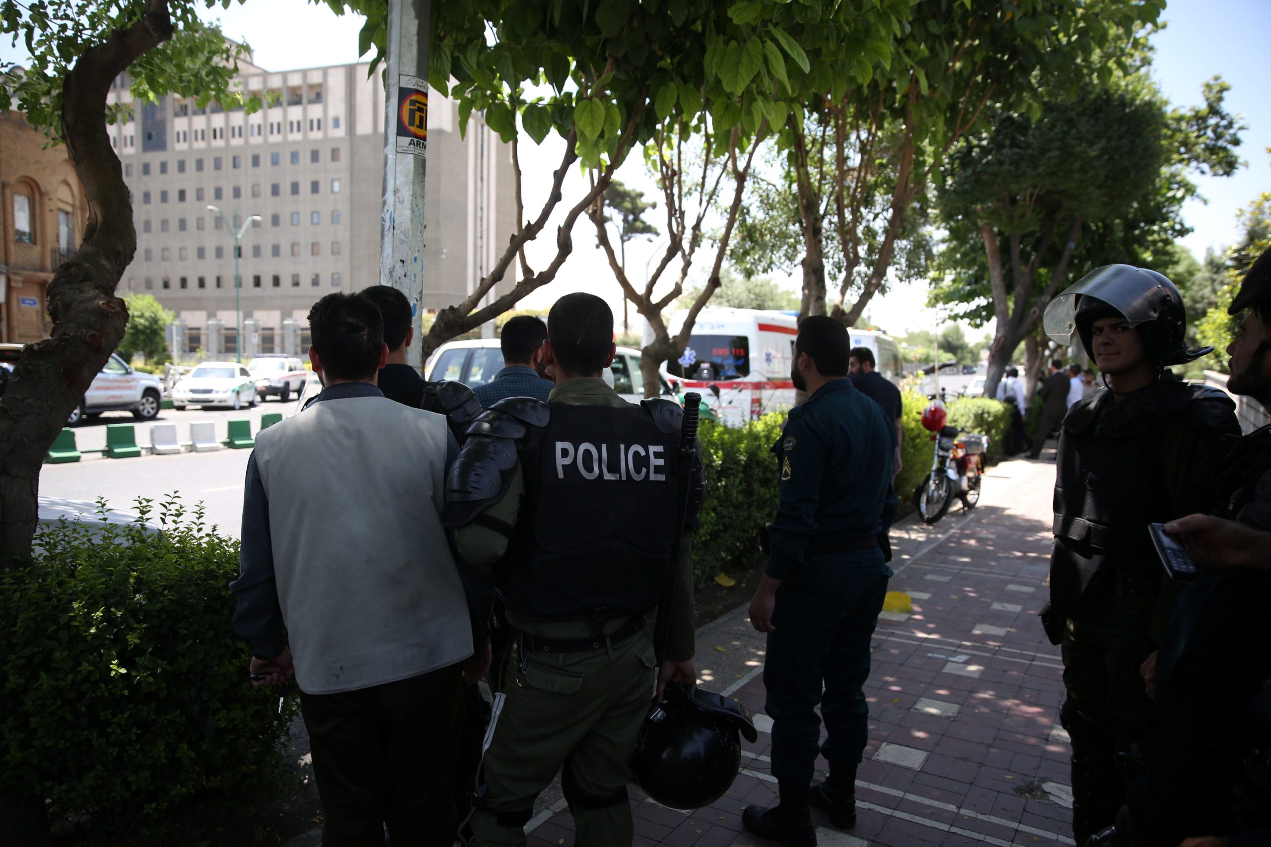 Iranian police stand near the parliament's building during a gunmen attack in central Tehran, Iran, June 7, 2017. TIMA via REUTERS ATTENTION EDITORS - THIS IMAGE WAS PROVIDED BY A THIRD PARTY. FOR EDITORIAL USE ONLY.