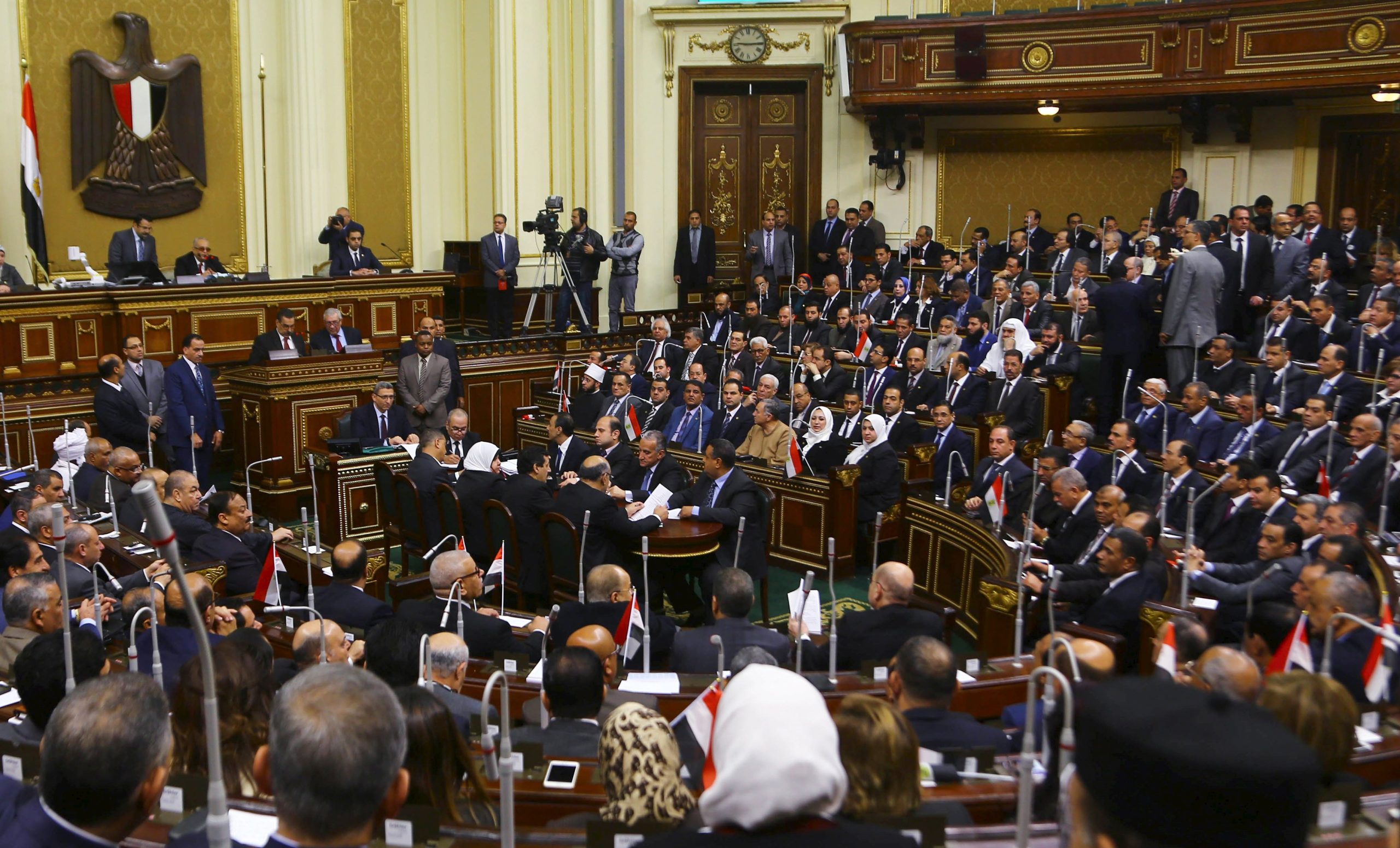 Members of the Egyptian parliament attend the opening session at the main headquarters of Parliament in Cairo, Egypt, January 10, 2016. Egypt's new parliament held its opening session on Sunday, state television reported, more than three years after a court dissolved the old Islamist-dominated chamber. REUTERS/Stringer EDITORIAL USE ONLY. NO RESALES. NO ARCHIVE