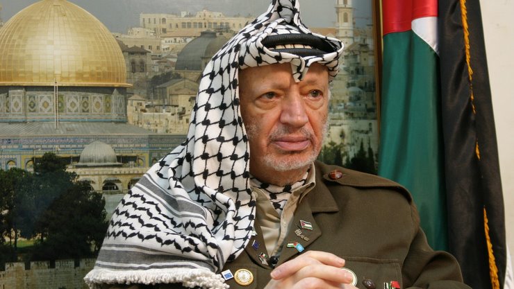 Palestinian Leader Yasser Arafat gestures during a television interview on late Saturday, 07 June 2003, in his office at his headquarter in Ramallah. Arafat talks about a security plan that would lead to the end of violence in the West Bank and Gaza. EPA-PHOTO/EPA/ATEF SAFADI