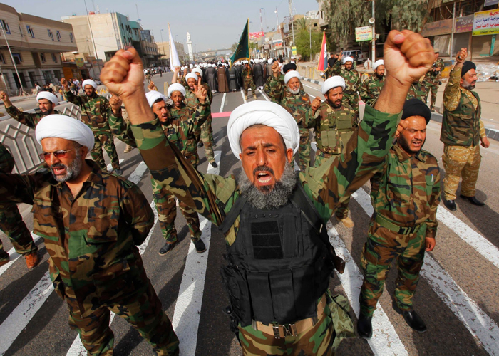 “السيستاني” يدعو إلى إدماج “الحشد الشعبي” في المنظومة الأمنية العراقية