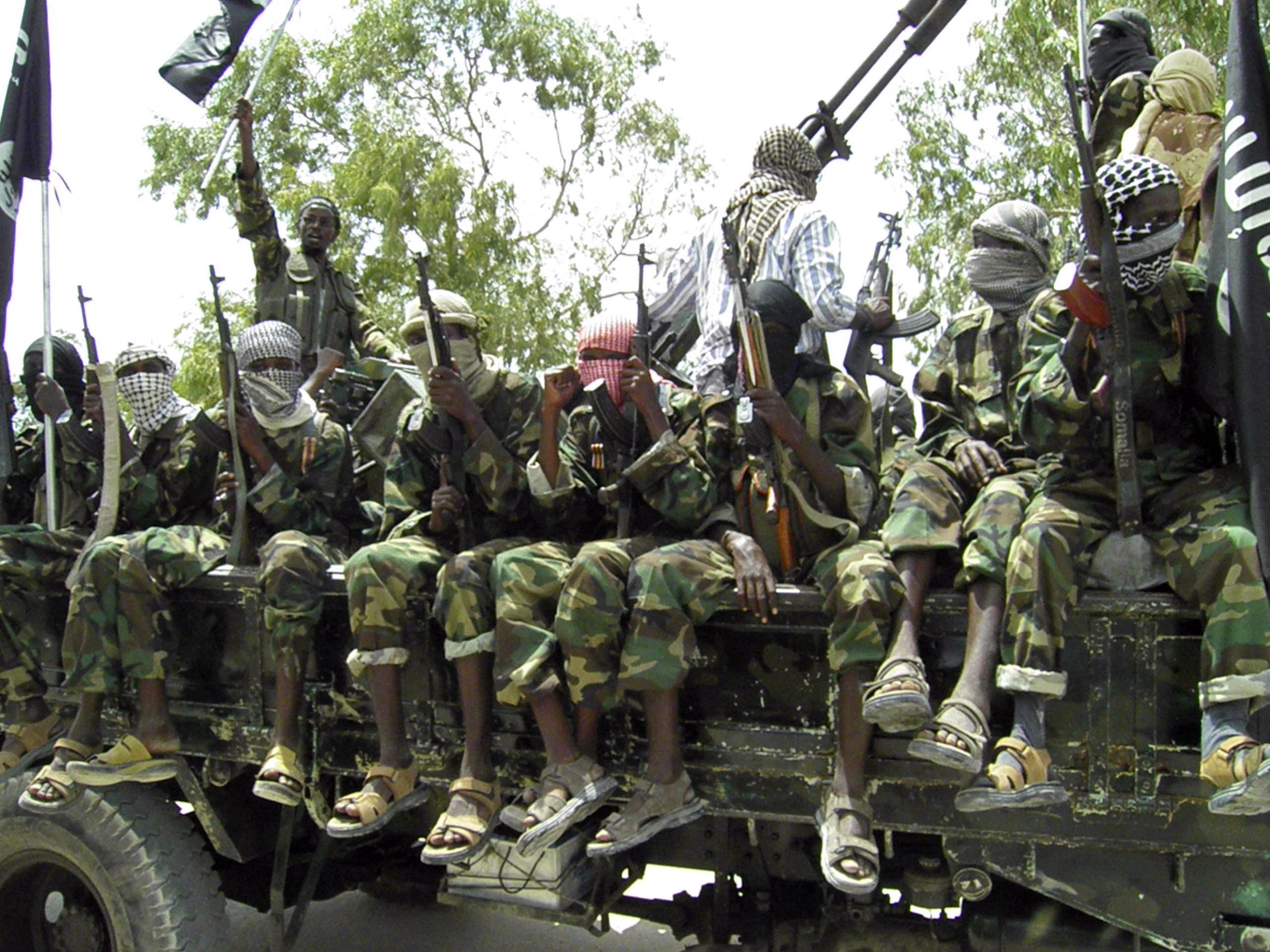 In this photo of Thursaday, Oct.21, 2010, Al-Shabaab fighters display weopons as they conduct military exercises in northern Mogadishu, Somalia A failed offensive by Somalia's strongest insurgent group has left at least 20 people dead as the Islamist group attempted to recapture a district in southwestern Somalia from government forces, an official and a witness said Friday. The attempt by al-Shabab, an al-Qaida-linked Somali militia, to win back a district near Kenya's border left 12 people injured, said local resident Osman Gelle. Gelle said the violence, which started Thursday afternoon, was the worst he had seen in more than a year. Somali government forces took over the Beled-Hawa district last Sunday in an offensive launched to take back areas held by militants. Al-Shabab militants took control of the area in Jan. 2009 after Ethiopian troops, who had entered to support Somalia's transitional government, withdrew from Somalia. The militia group briefly lost control of the town in Aug. 2009 to Ahlu Sunna Waljamea, a moderate Islamist group allied to the government.
(AP Photo/Mohamed Sheikh Nor)