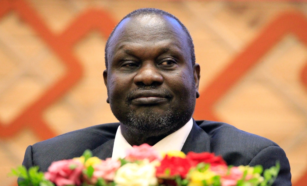FILE PHOTO: South Sudan rebel leader Riek Machar Kiir attends the signing in Khartoum, Sudan of an accord with the South Sudan government aimed at ending the country's civil war, June 27, 2018. REUTERS/Mohamed Nureldin Abdallah/File Photo