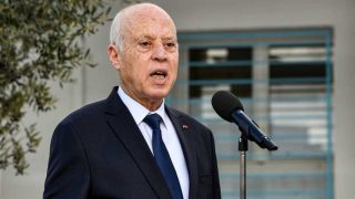 Tunisia's President Kais Saied speaks to reporters after voting in the 2023 local elections in the locality of Mnihla in Ariana province on the outskirts of Tunis on December 24, 2023. (Photo by FETHI BELAID / AFP) (Photo by FETHI BELAID/AFP via Getty Images)