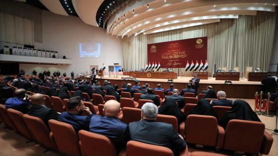 Iraqi lawmakers attend a session of the Iraqi parliament in Baghdad, Iraq, March 26, 2022. Iraqi Parliament Media Office/Handout via REUTERS ATTENTION EDITORS - THIS IMAGE HAS BEEN SUPPLIED BY A THIRD PARTY