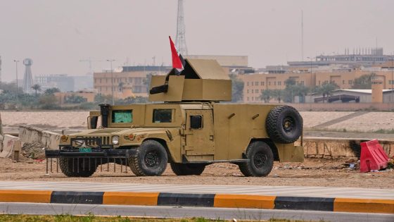 An Iraqi army armoured humvee vehicle is deployed near the banks of the Tigris River to protect the U.S. Embassy fortified "Green Zone" in Baghdad, Saturday, March 14, 2026. (AP Photo/Hadi Mizban)