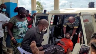 FILE PHOTO: A man is carried from an ambulance as he arrives at Bunia General Referral Hospital following confirmation of an Ebola outbreak involving the Bundibugyo strain in Bunia, Ituri province, Democratic Republic of Congo, May 16, 2026. REUTERS/Victoire Mukenge/File Photo