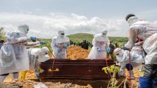 Red Cross workers bury an Ebola victim at the Rwampara Cemetery, in Rwampara, Congo, Saturday, May 23, 2026. (AP Photo/Moses Sawasawa) CORRECTION: City corrected to Rwampara, instead of Bunia