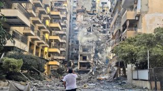 A man looks at the damages at the site of an Israeli strike in Tyre, southern Lebanon, on May 28, 2026. The Israeli military said on May 28 it had begun new strikes on Hezbollah infrastructure around the southern Lebanese city of Tyre after issuing an evacuation warning to its residents. (Photo by KAWNAT HAJU / AFP)