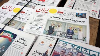 epa12711485 A copy of the Iranian daily newspaper 'Iran' featuring a picture of Iranian foreign minister Abbas Araghchi, US special envoy Steve Witkoff with Oman foreign minister Badr bin Hamad Al Busaidi, titled 'Good start' is displayed outside a kiosk in Tehran, Iran, 07 February 2026. Iranian foreign minister Abbas Araghchi called the negotiations with the USA positive and said both side agreed to continue the negotiations.  EPA/ABEDIN TAHERKENAREH