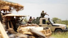 FILE PHOTO: Malian soldiers are pictured during a patrol with soldiers from the new Takuba force near Niger border in Dansongo Circle, Mali August 23, 2021. Picture taken August 23, 2021. REUTERS/ Paul Lorgerie/File Photo
