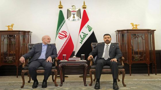 This handout photograph taken and released by the Iraq's Prime Minister Media Office on August 19, 2026 shows Iran's Parliament Speaker Mohammad Bagher Ghalibaf (L) and Iraq's Prime Minister Ali al-Zaidi during their meeting in Baghdad. (Photo by Iraq's Prime Minister Media Office / AFP) / RESTRICTED TO EDITORIAL USE - MANDATORY CREDIT "AFP PHOTO / Iraq's Prime Minister Media Office" - HANDOUT - NO MARKETING NO ADVERTISING CAMPAIGNS - DISTRIBUTED AS A SERVICE TO CLIENTS
